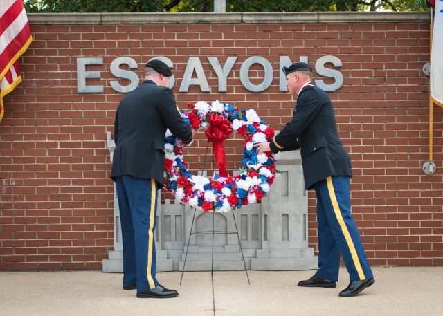 Col. Daniel Hibner, U.S. Army Engineer School commandant (right), and USAES Command Sgt. Maj. John Brennan lay a wreath at the Engineer Memorial during the Fallen Sapper Tribute ceremony Aug. 26 at Memorial Grove. The event was part of Engineer...