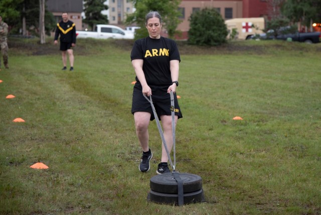 Maj. Virginia Brickner, deputy commander for the U.S. Army Corps of Engineers – Alaska District, pulls a 90-pound sled during the sprint-drag-carry portion of the Army Combat Fitness Test on Aug. 17 at Joint Base Elmendorf Richardson. She appreciates this event because she feels a sense of accomplishment when crossing the finish line. (U.S. Army photo, Rachel Napolitan)