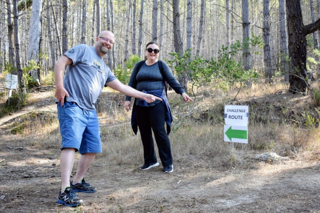 Elaine Vrolyks, school liaison officer for the Presidio of Monterey, and Dave Slater, a functional technology specialist for Children and Youth Services, PoM, gear up for the “challenge route” during the Volksmarch at the Presidio of Monterey,...