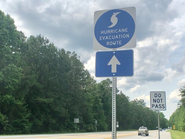 A sign outside of Fort Stewart shows a hurricane evacuation route. With hurricane season lasting from June until November in Coastal Georgia, it’s vital that Soldiers and their families understand evacuation entitlements available to them. (Photo by Molly Cooke/Fort Stewart Garrison Public Affairs)