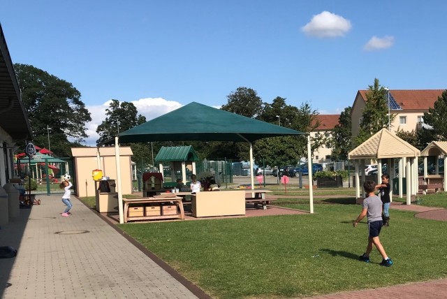 Children at the Clay Kaserne Child Development Center enjoy their play time at the center. The new fee policy for care at the center goes into effect Sept. 2.