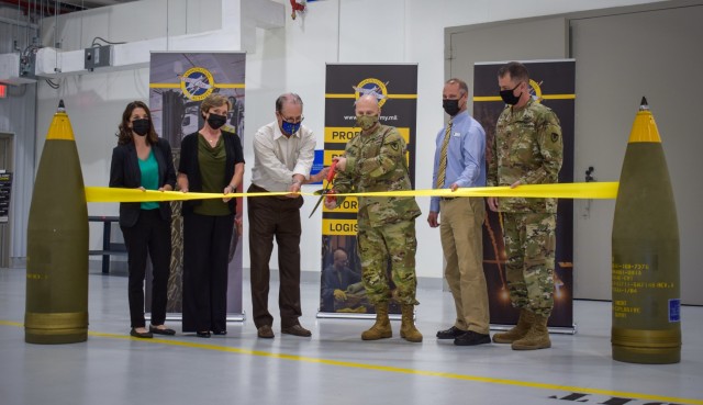 AMC and JMC commanders, Senator Mike Braun and Crane Army Ammunition Activity employees gather to cut the ribbon and ceremonially open Crane Army’s newest facilities. From left: Lauren Shipman, CAAA civil engineer; Victoria McKibben, CAAA...