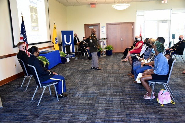 Command Sgt. Maj. Finis Dodson, command sergeant major, U.S. Army Space and Missile Defense Command, speaks during the University of Memphis, Tennessee, Tiger Battalion ROTC commissioning ceremony, Aug. 27. 2nd Lt. Diamon Thomas and 2nd Lt....