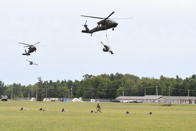 The Fort Drum and North Country communities got a sample of the sights and sounds of 10th Mountain Division (LI) Soldiers, artillery, aircraft and vehicles in action Sept. 1 during a live demonstration on Division Hill. The 30-minute demo traced the history of the 10th Mountain Division from its origin as an elite mountain warfare unit to its current capabilities. Afterward, the Salute to the Nation ceremony presented a roll call of the 50 state and six territory flags in the order they joined the union. (Photo by Mike Strasser, Fort Drum Garrison Public Affairs)