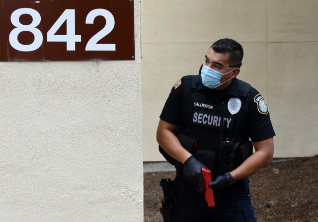 Officer Eli Calderon, a Presidio of Monterey security guard, participates in an active-shooter response drill at the Price Fitness Center, Presidio of Monterey, Calif., Aug. 5, 2021.