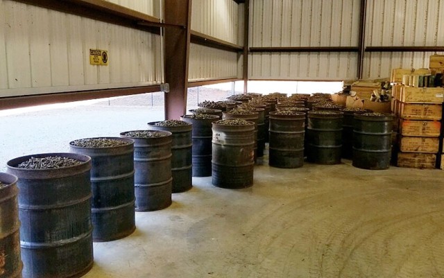 Crates and barrels filled with brass casings are “money in the bank” for Fort Lee. Before it’s sold, the material is sent through specialized “popper and deformer” equipment to ensure it can be safely loaded, hauled away and recycled. The latest shipment of 37,180 pounds netted just over $87,000 for the installation. (U.S. Army Photo)