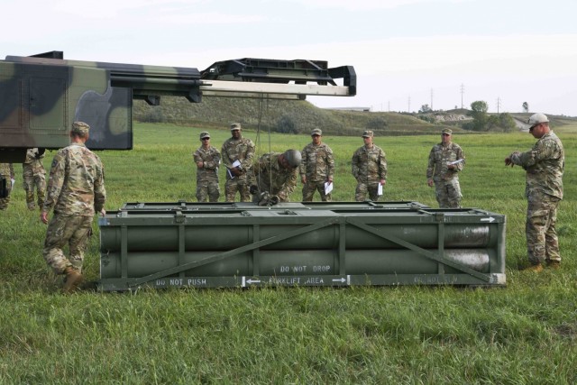 Members of the U.S. Army’s Bravo Battery, 4th Battalion, 4th Security Forces Assistance Brigade, evaluate operations of the High Mobility Artillery Rocket System while attending the Combined Duties Training Course hosted by the 2nd Battalion 196th Regiment (Regional Training Institute), South Dakota National Guard, Aug. 28, 2021, in Sioux Falls, S.D. The training prepared 4-4th SFAB for deployment to Europe. (Photo by Staff Sgt. Dustin Jordan)