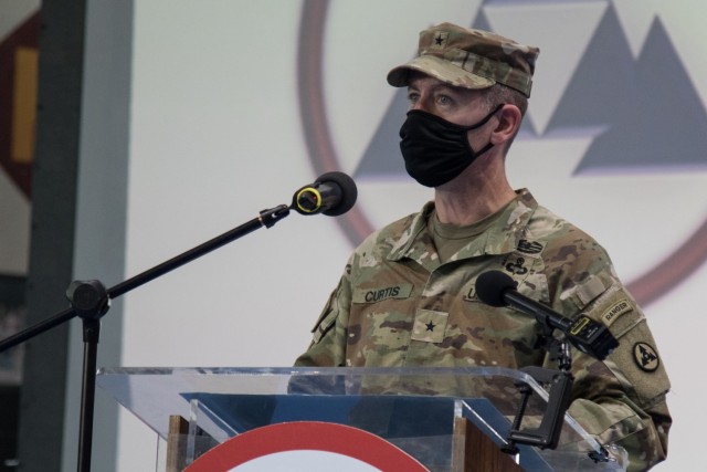 Brig. Gen. Lance G. Curtis, commander of the 3rd Expeditionary Sustainment Command, speaks during a transfer of authority ceremony at Camp Arifjan, Kuwait, on Aug. 28, 2021. The ceremony was symbolic of 3rd ESC, deployed out of Fort Bragg, North Carolina, assuming the operational command post mission for the 1st Theater Sustainment Command from the 310th Expeditionary Sustainment Command. (U.S. Army photo by Sgt. 1st Class Mary S. Katzenberger)