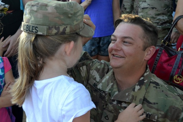 The National Fatherhood Initiative is one of many collaborative programs the Army has with local community programs to promote positive parenting and family life. (Photo by Winifred Brown, Fort Bliss Public Affairs Office)