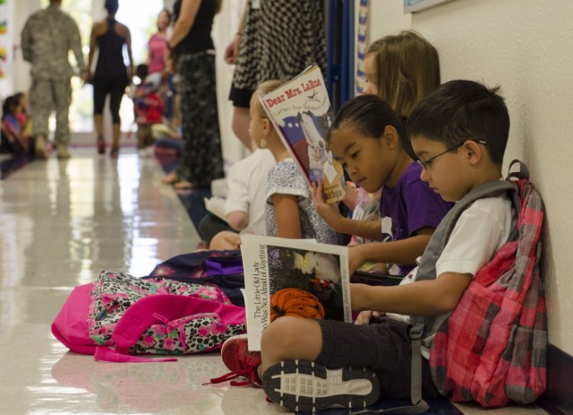 Back to school can be a stressful time for kids and parents. Army Community Service has a variety of programs and support available to assist families across a multitude of areas. (Photo by Staff Sgt. Michael Folkerth, 4th Public Affairs Detachment)