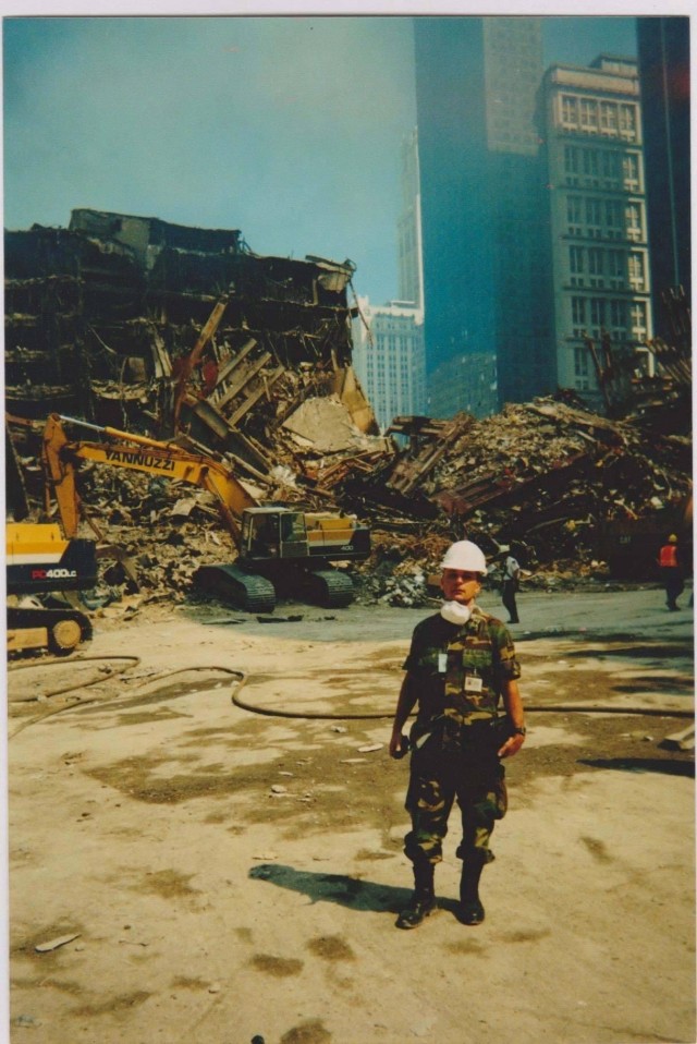 New York Army National Guard Maj. Edward Keyrouze assists at the still smoldering &#34;rubble pile&#34; at Ground Zero following the attack on the World Trade Center towers in New York Sept. 11, 2001. More than 14,000 New York National Guard members responded to the attacks. (Photo courtesy of Edward Keyrouze)