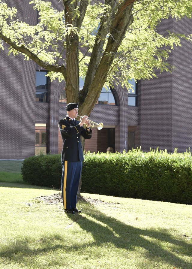 Sgt. Mason Rorapaugh, 399th Army Band, performs Taps during the Patriot Day remembrance ceremony Sept. 9 at the Maneuver Support Center of Excellence Plaza.