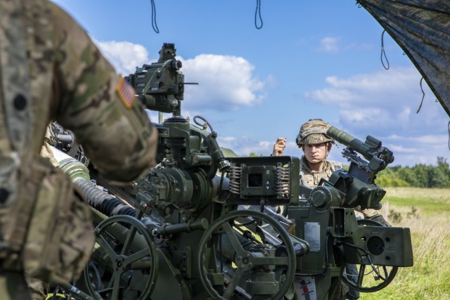 A Soldier with Archer Battery, Field Artillery Squadron, 2nd Calvary Regiment, waits to fire his squad's assigned M777A2 Howitzer during the Saber Junction 21 live-fire exercise Sept. 1, 2021, in Grafenwoehr Training Area, Germany. The U.S. Army...