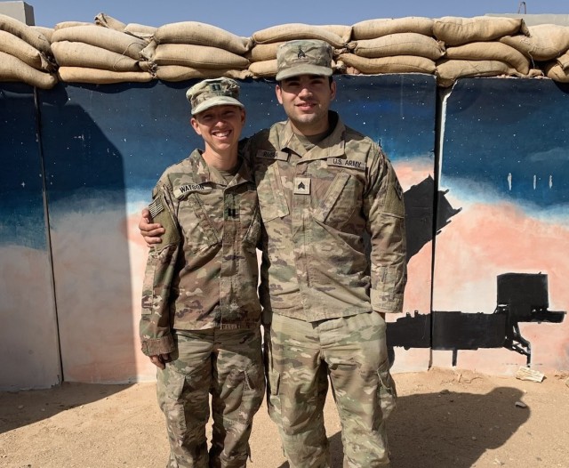 Cpt. Brittany Watson, a Medical Operations Officer in the 111th Engineer Brigade, and Sgt. Andres Rivera, a Carpentry and Masonry Specialist in the 766th Engineer Company of the 111th, recently reunited during a deployment to the Middle East....