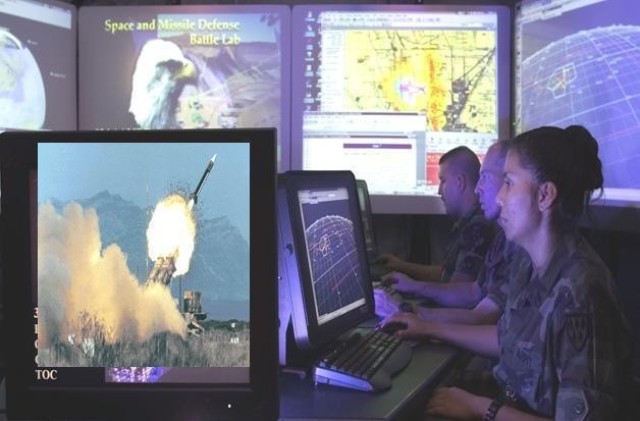 The Space and Missile Defense Battle Lab deploys the Force Projection Tactical Operations Center, an advanced communications and information collection system with a combined team of military, civilians and contractors, to support combat air patrol operations following the Sept. 11, 2001 terrorist attacks. (U.S. Army photo)
