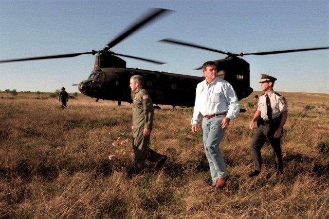 Left to right, Maj. Gen. William Lynch, Pennsylvania National Guard adjutant general; Pennsylvania Gov. Tom Ridge; and Pennsylvania State Police Commissioner Paul Evanko leave a CH-47 Chinook helicopter from the Pennsylvania National Guard's...
