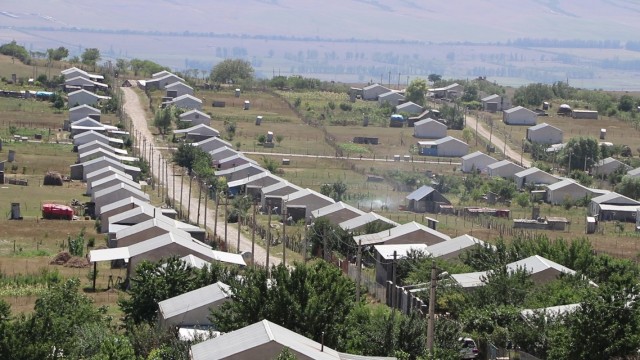 The Prezeti Internally Displaced Persons settlement in Georgia is seen here on August 4, 2021, the day of a ceremony recognizing the completion of a newly constructed water storage tank and electric-powered pump station serving the community. The...