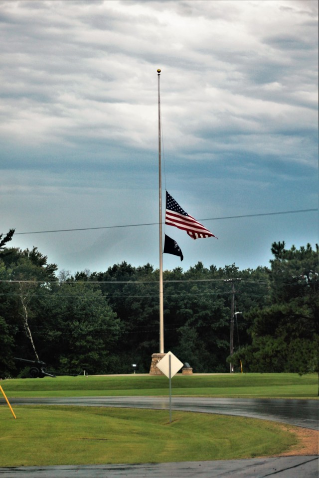 The United States flag flies at half-staff Aug. 27, 2021, at Fort McCoy, Wis. The lowering of the flag was a mark of respect in recognition of the U.S. service members and other victims killed in a terrorist attack Aug. 26, 2021, in Kabul,...