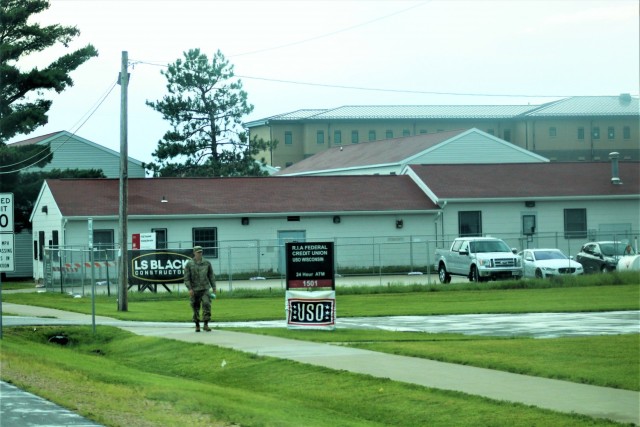 A Soldier walks past the Wisconsin USO office Aug. 26, 2021, at Fort McCoy, Wis. In 2021, the USO has supported thousands of service members. The USO began a full presence at Fort McCoy in 2018. (U.S. Army Photo by Scott T. Sturkol, Public Affairs...