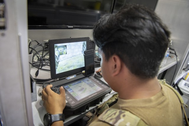 An Air National Guard explosive ordnance disposal Airman completes a training scenario July 28, 2021, at the Fort McCoy (Wis.) Combined Arms Collective Training Facility as part of the Audacious Warrior 2021 exercise. Since 2017, explosive...