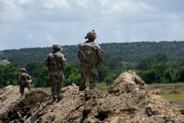 Engineers with 3rd Brigade Engineer Battalion, 3rd Armored Brigade Combat Team, 1st Cavalry Division, man a berm during a combined arms breach exercise, Fort Hood, Texas, June 6, 2021. (U.S. Army photo by Sgt. Calab Franklin)