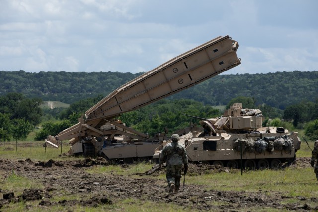 GREYWOLF Engineers with 3rd Brigade Engineer Battalion, 3rd Armored Brigade Combat Team, 1st Cavalry Division, begin to raise the base on a Joint Assault Bridge (JAB) during a combined arms breach exercise, Fort Hood, Texas, June 6, 2021. The exercise included 3rd Battalion, 8th Cavalry Regiment and 2nd Battalion, 82nd Field Artillery Regiment; marking the first time in history that both an M1A2 SEPv3 Abrams Main Battle Tank and a M109A7 Paladin have crossed over the JAB. (U.S. Army photo by Sgt. Calab Franklin)