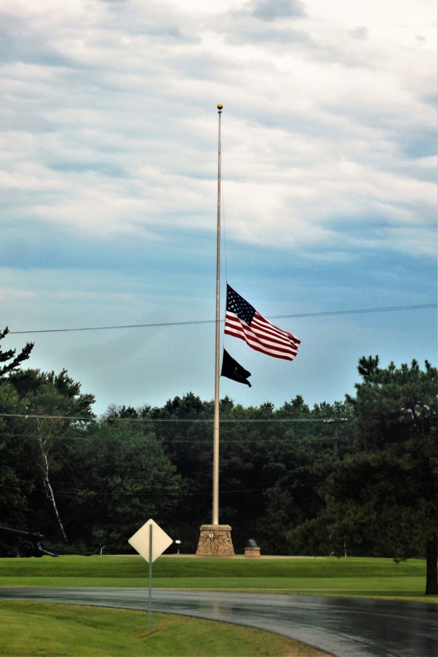 The United States flag flies at half-staff Aug. 27, 2021, at Fort McCoy, Wis. The lowering of the flag was a mark of respect in recognition of the U.S. service members and other victims killed in a terrorist attack Aug. 26, 2021, in Kabul,...
