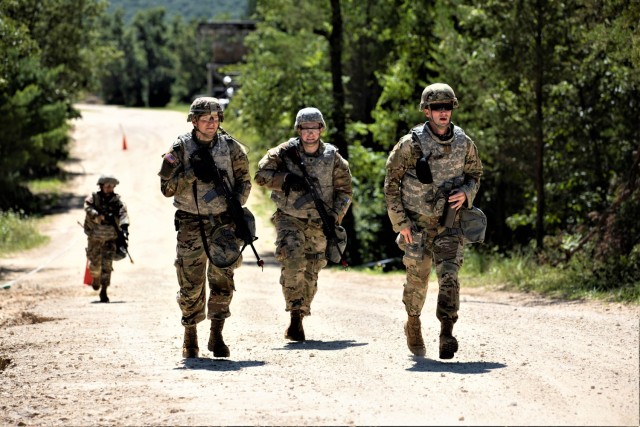 Quick reaction force Soldiers with 147th Human Resources Command of the Minnesota National Guard run toward an entry control point Aug. 16, 2021, during a training exercise as part of the 78th Training Division's Combat Support Training Exercise...