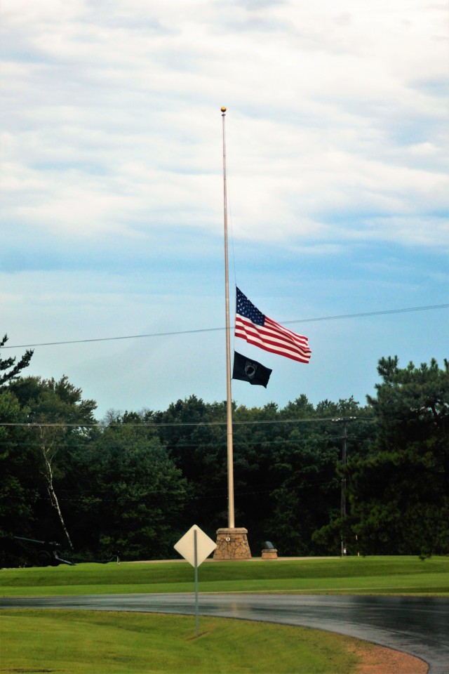 The United States flag flies at half-staff Aug. 27, 2021, at Fort McCoy, Wis. The lowering of the flag was a mark of respect in recognition of the U.S. service members and other victims killed in a terrorist attack Aug. 26, 2021, in Kabul,...