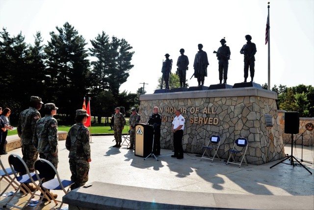 Members of the Fort McCoy community participate in a Patriot Day ceremony and a 20th anniversary remembrance of the Sept. 11, 2001, terrorist attacks on America on Sept. 10, 2021, at Veterans Memorial Plaza at the Commemorative Area at Fort McCoy,...