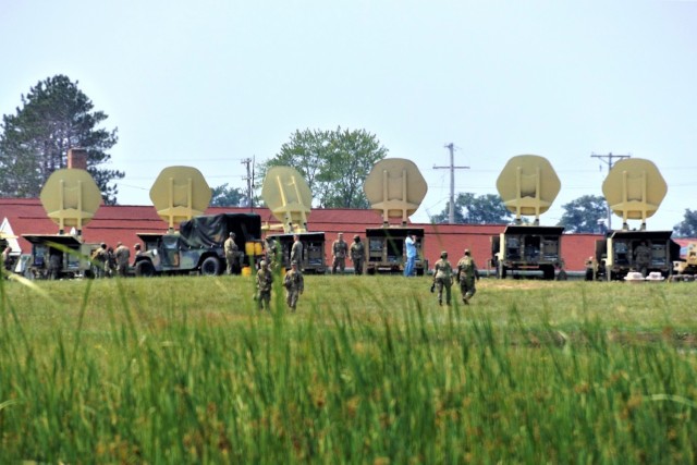 Army Signal Corps troops have an area of Fort McCoy, Wis., set up Aug. 4, 2021, to support communications for the 78th Training Division Combat Support Training Exercise 78-21-04 and for exercise Grecian Firebolt 2021. Soldiers with the 335th...