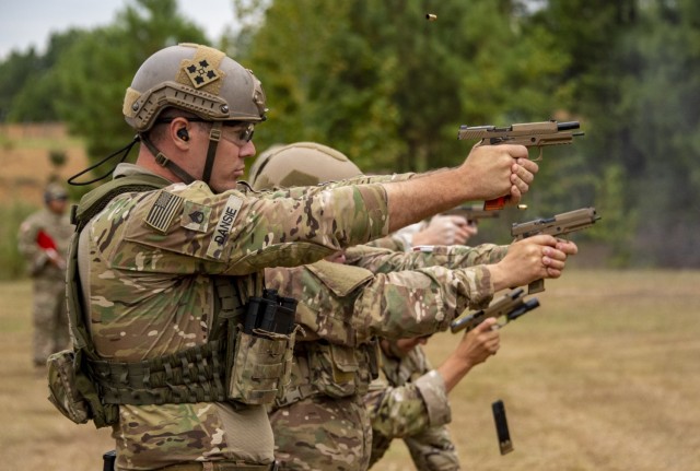 Staff Sgt. James Dansie, Utah National Guard, fires his pistol Sept. 2, 2021, during the General George Patton Combat Pistol match of the 50th Winston P. Wilson and the 30th Armed Forces Skill at Arms Championships, hosted by the National Guard...
