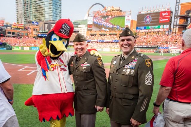 Maj. Gen. James Bonner, Maneuver Support Center of Excellence and Fort Leonard Wood commanding general (center), and MSCoE and Fort Leonard Wood Command Sgt. Maj. Randolph Delapena met Fredbird, the St. Louis Cardinals&#39; mascot, Saturday during...