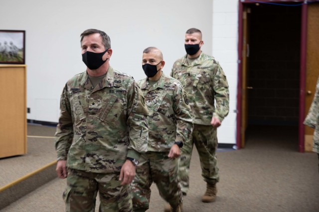 The official party arrives for the 86th Training Division assumption of command ceremony, Sept. 11, at Fort McCoy, Wis. Incoming commanding general, Brig. Gen. Robert E. Guidry, leads the party, followed by Maj. Gen. Miguel A. Castellanos,...