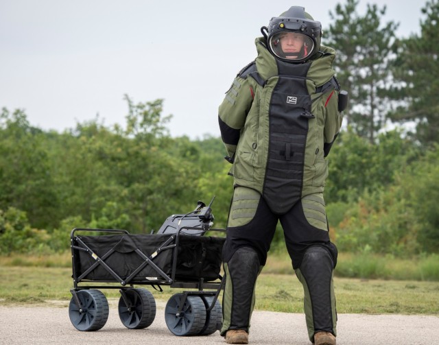 An Air National Guard explosive ordnance disposal Airman completes a training scenario July 28, 2021, at the Fort McCoy (Wis.) Combined Arms Collective Training Facility as part of the Audacious Warrior 2021 exercise. Since 2017, explosive...