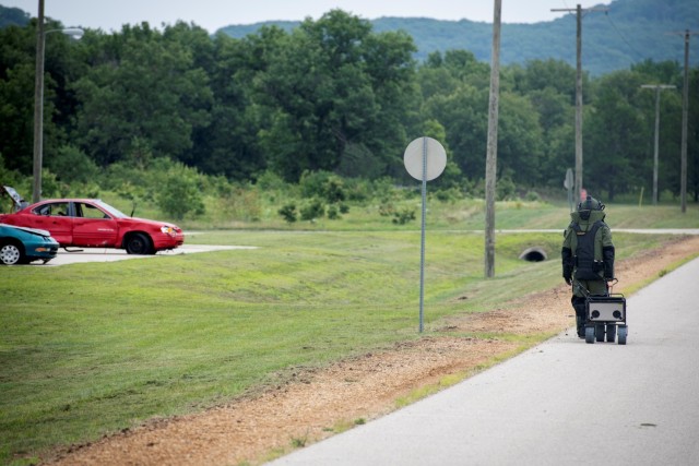 An Air National Guard explosive ordnance disposal Airman completes a training scenario July 28, 2021, at the Fort McCoy (Wis.) Combined Arms Collective Training Facility as part of the Audacious Warrior 2021 exercise. Since 2017, explosive...