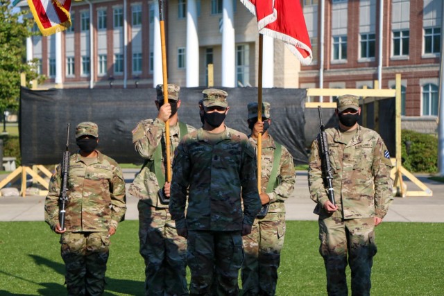 Command Sgt. Maj. Jonathan Saunders officially takes his place as the 9th Brigade Engineer Battalion, 2nd Armor Brigade Combat Team, 3rd Infantry Division, command sergeant major during a change of responsibility ceremony at Cashe Garden, Fort...