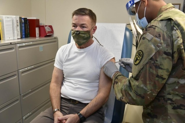 Gen. James C. McConville, Chief of Staff of the Army, receives his first dose of the COVID-19 vaccine.