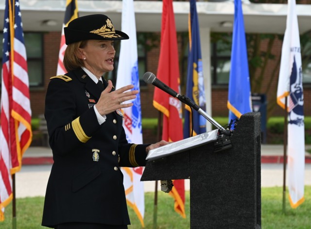 Brig. Gen. Mary V. Krueger, commanding general, Regional Health Command-Atlantic, provides remarks during a ceremony celebrating Kimbrough Ambulatory Care Center’s 60th anniversary at the facility’s main entrance, Sept. 14, 2021. The ceremony, themed “An Enduring Legacy of Quality Care and Service” highlighted Kimbrough’s ability to provide day-to-day care to beneficiaries while maintaining operational readiness to service members and joint interagency partners. (U.S. Army photo by Chuck Yang)