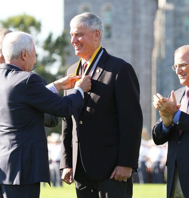 Retired Gen. David M. Rodriguez, the last officer from the U.S. Military Academy Class of 1976 to retire, receives his Distinguished Graduate Award medal during the DGA ceremony Sept. 11 on the Plain. Rodriguez accomplished much in his 40-year...