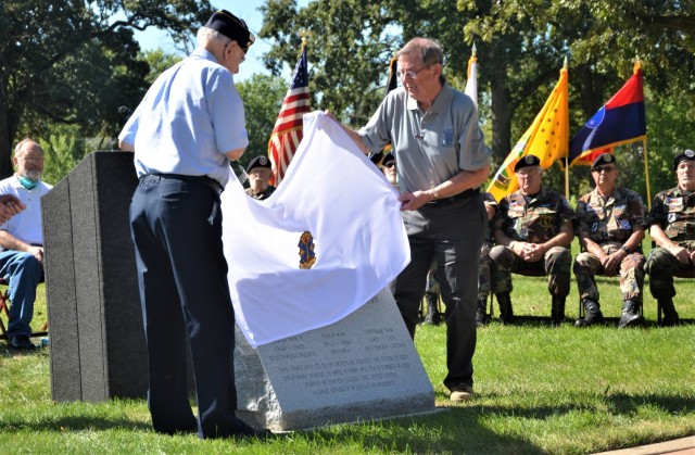 World War II Americal veteran, Walter Lehman, and Americal Legacy Foundation’s Roger Gilmore participate in the official unveiling of the Americal Division Memorial at Rock Island National Cemetery in Illinois. Photo by: Staci-Jill Burnley, ASC...