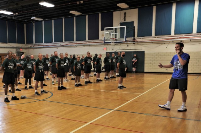 Former University of Kentucky basketball player Jarrod Polson leads cadets from the Bluegrass ChalleNGe Academy at Fort Knox in the Shoot Hoops Not Drugs camp Sept. 14, 2021.