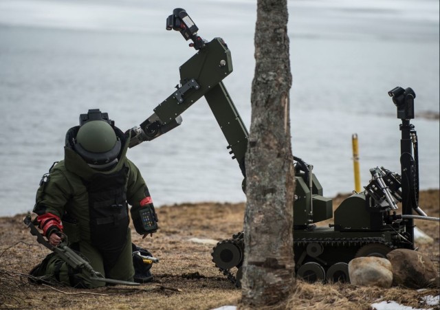 An Explosive Ordnance Disposal Technician work to detect an explosive device during Exercise Ardent Defender 2014 in Halifax, Nova Scotia.  Held in Canada every year since 2012, the multinational exercise will be held at Canadian Forces Base Borden in Borden, Ontario, from Sept. 18 – Oct. 22, 2021.  Canadian Armed Forces photo by Cpl. Chris Ringus, 5th Canadian Division.