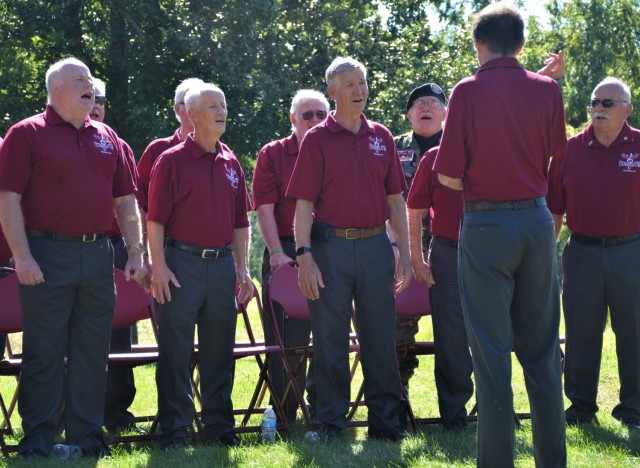 Attendees at the Americal Division Memorial Dedication at Rock Island National Cemetery in Illinois were treated to a patriotic musical presentation by the Chord Busters choral group from Davenport, Iowa. Photo by: Staci-Jill Burnley, ASC Public...