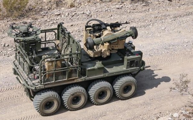 An Army autonomous weapons system known as “Origin” maneuvers through desert terrain as weapons testing commences during Project Convergence 20 at Yuma Proving Ground, Arizona, August 25, 2020. 