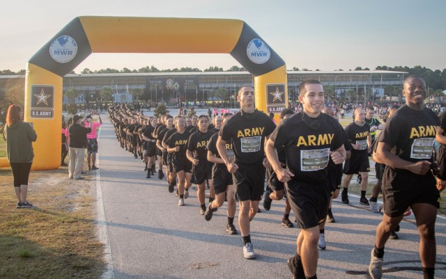 Fort Jackson Basic Combat Trainees take their first steps during the annual 5K Run/Walk for the Fallen on Sept. 11, 2021. More than 1,000 Soldiers, trainees, veterans, civilians and Gold Star Family members attend the event  and many wore bibs bearing the rank and names of Soldiers killed in action since Sept. 11, 2001.