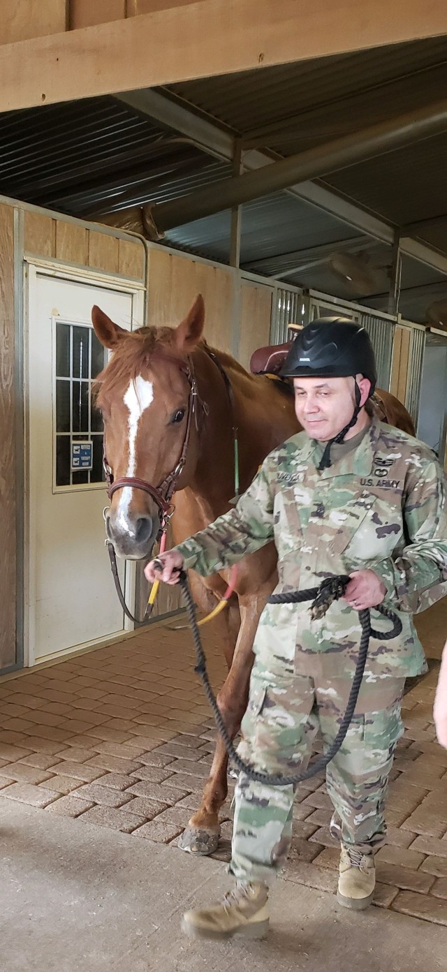 Sgt. Maj. George Olivencia, a Soldier assigned to the Fort Hood Soldier Recovery Unit, Texas, participated in a therapeutic horseback riding program on May 24 at a facility located in McGregor, Texas. (Photo courtesy of Amy Summers)