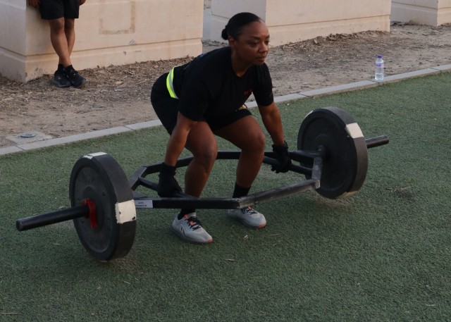 3rd Expeditionary Sustainment Command's Command Sgt. Maj. Phelicea M. Redd deadlifts during a Sept. 12, 2021, physical fitness round-robin for sergeants major from across Camp Arifjan, Kuwait, led by U.S. Army Central Command's Command Sgt. Maj. Brian A. Hester. Redd said, "This is a great team-building event. I met a lot of sergeants major that I haven't seen before, got to actually learn what unit they were in and where their hometown is and what they do for a living, if they're not active-duty, back home."