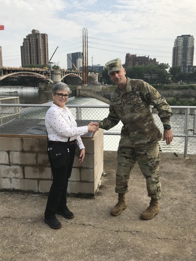Lt. Gen. Scott Spellmon, U.S. Army Corps of Engineers commanding general, meets wtih Nan Bischoff, project manger, at Upper St. Anthony Falls Lock and Dam in Minneapolis, Aug. 12.