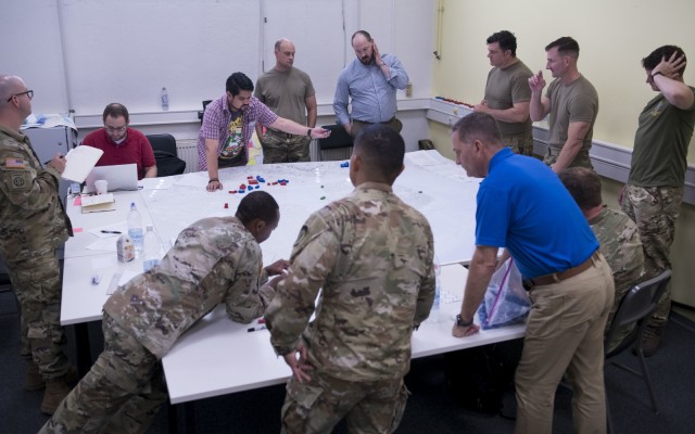 Students practice strategy during hands-on exercises at the Basic Analytic Wargaming Course taught by the Naval Postgraduate School Wargaming Mobile Education Team in Wiesbaden, Germany, Aug. 30 - Sept. 10, 2021. The course is five days long (40 contact hours) and built around hands-on practical exercises coordinated with the sponsoring organization. 